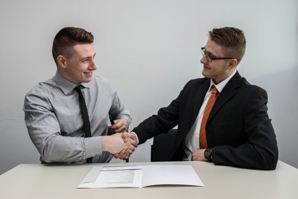 Two guys shaking hands
